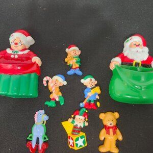 Vintage 1970s JSNY Santa & Mrs. Claus with Toys Plastic Fridge Magnet Set